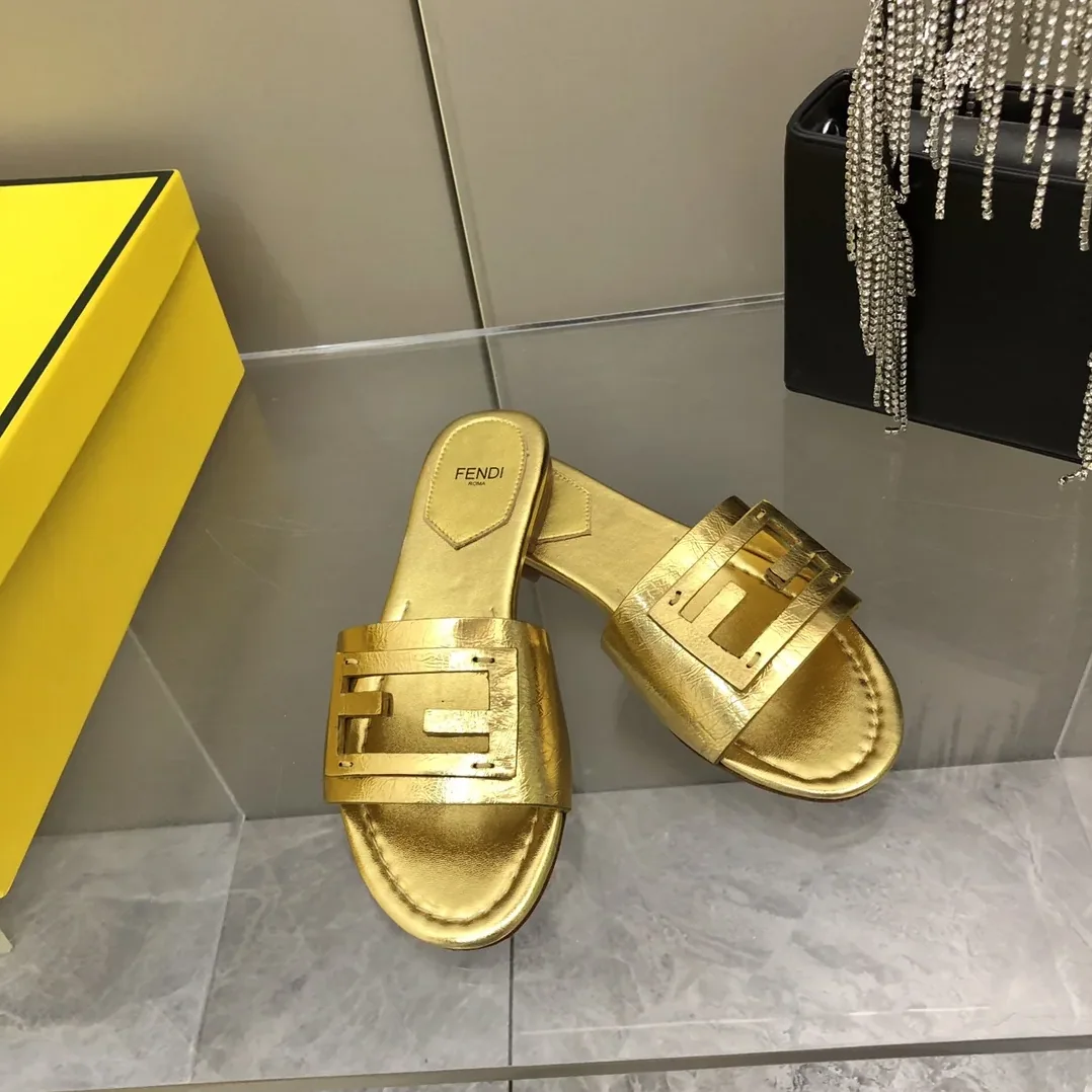 Fendi Baguette Gold Nappa Slides 8R8136AI16F0XV6 Fendi Baguette Gold Nappa Slides 8R8136AI16F0XV6