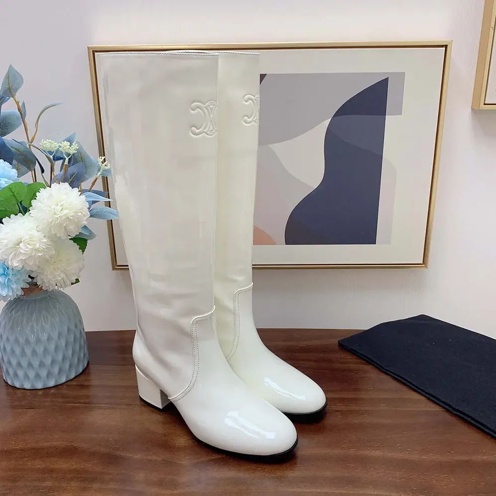 Celine Les Bottes Celine Triomphe High Boot in Patent Calfskin for Women in White