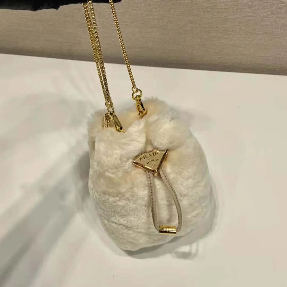 Prada Shearling Mini-pouch for Women in Beige