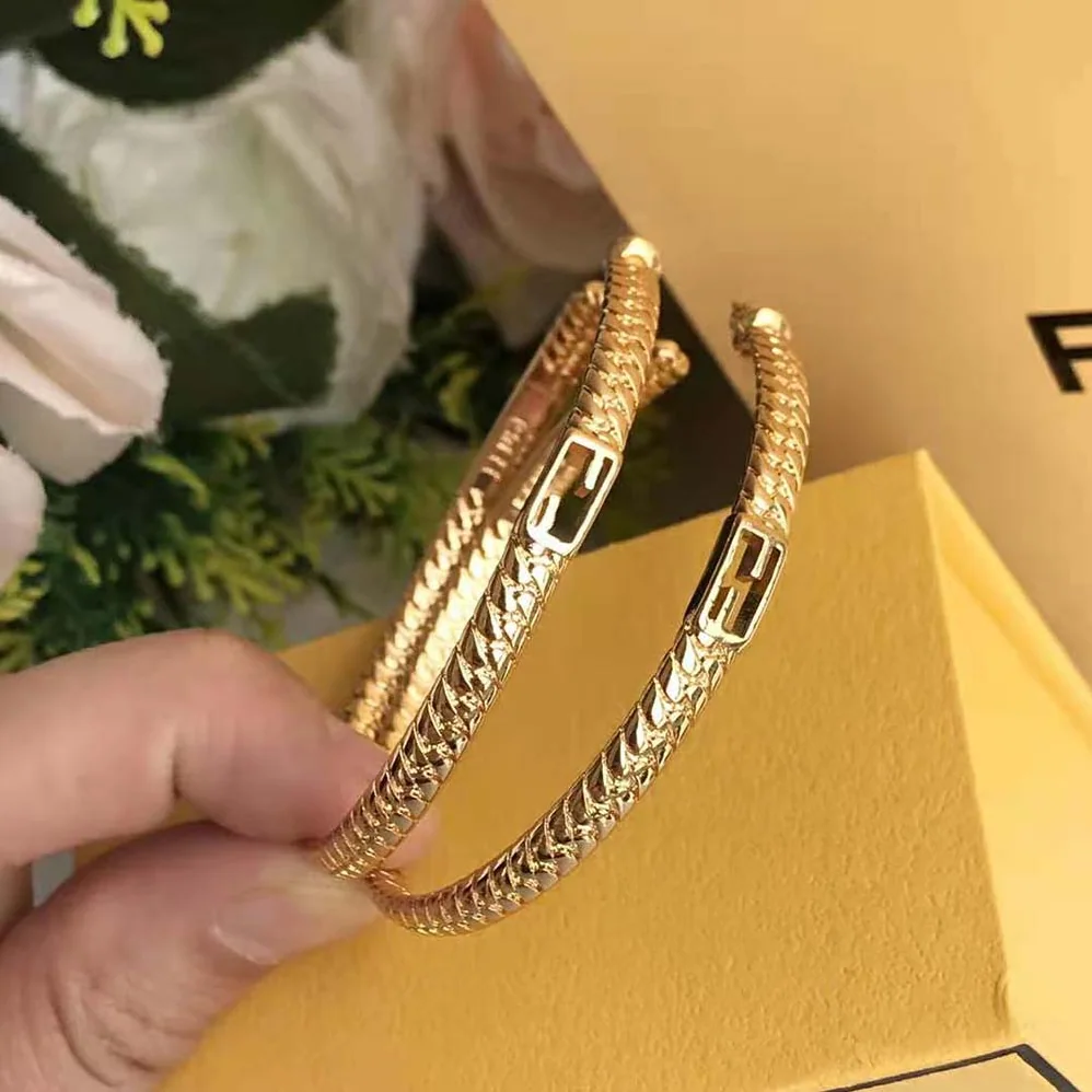 Fendi Baguette Large Earrings Gold for Women in Color Earrings