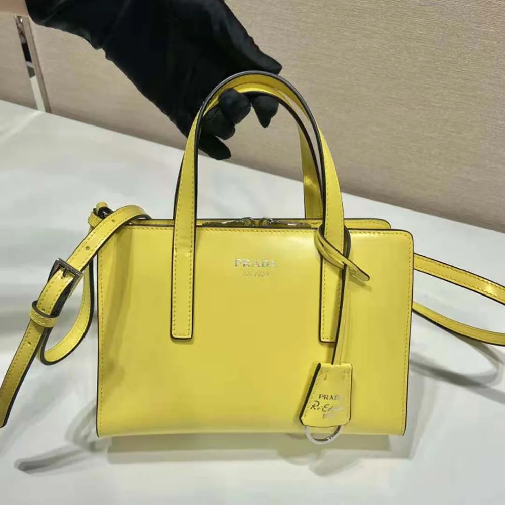 Prada Re-Edition 1995 Brushed-Leather Mini Handbag for Women in Yellow Prada Re-Edition 1995 Brushed-Leather Mini Handbag for Women in Yellow