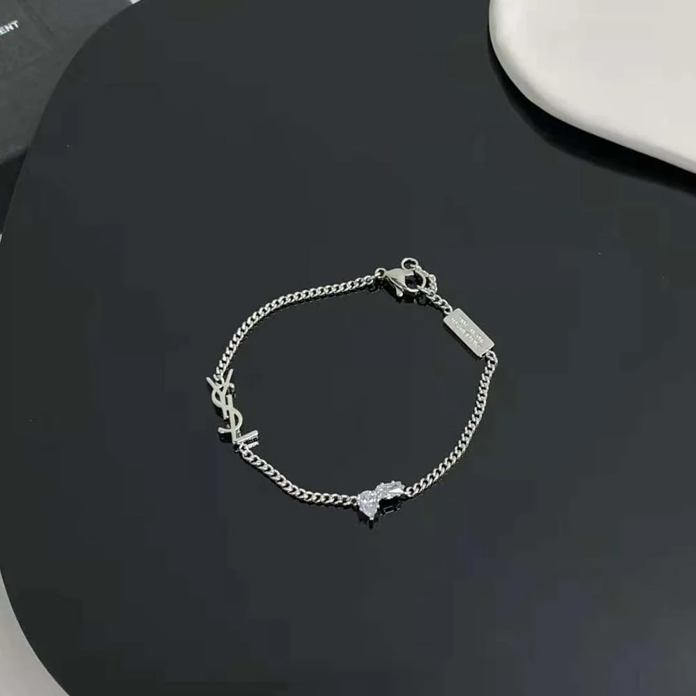 Saint Laurent YSL Opyum Charm Bracelet in Metal and Rhinestone for Women Saint Laurent YSL Opyum Charm Bracelet in Metal and Rhinestone for Women