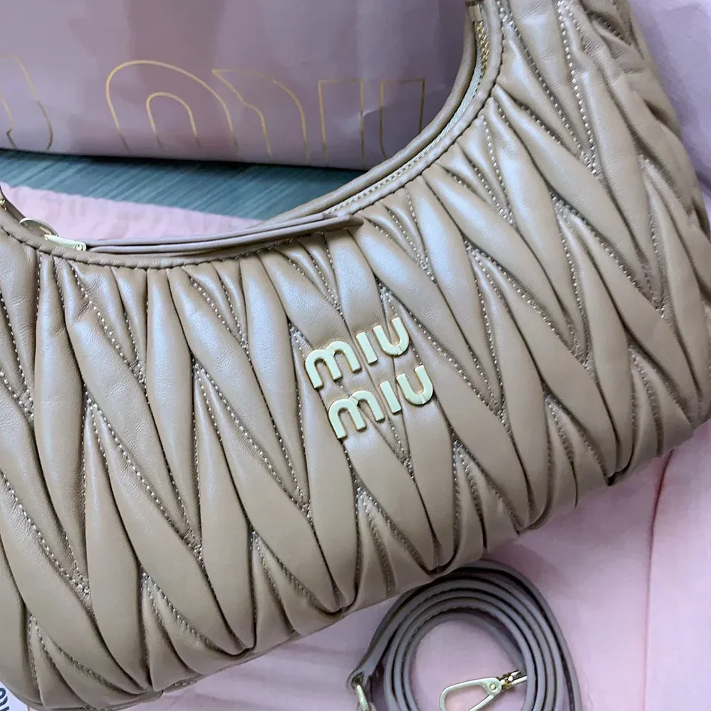 Miu Miu Wander Matelassé Nappa Leather Hobo Bag for Women in Caramel Miu Miu Wander Matelassé Nappa Leather Hobo Bag for Women in Caramel