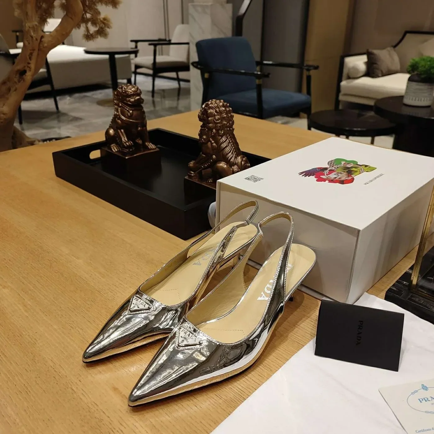 Prada Slingback Spike Pumps Silver