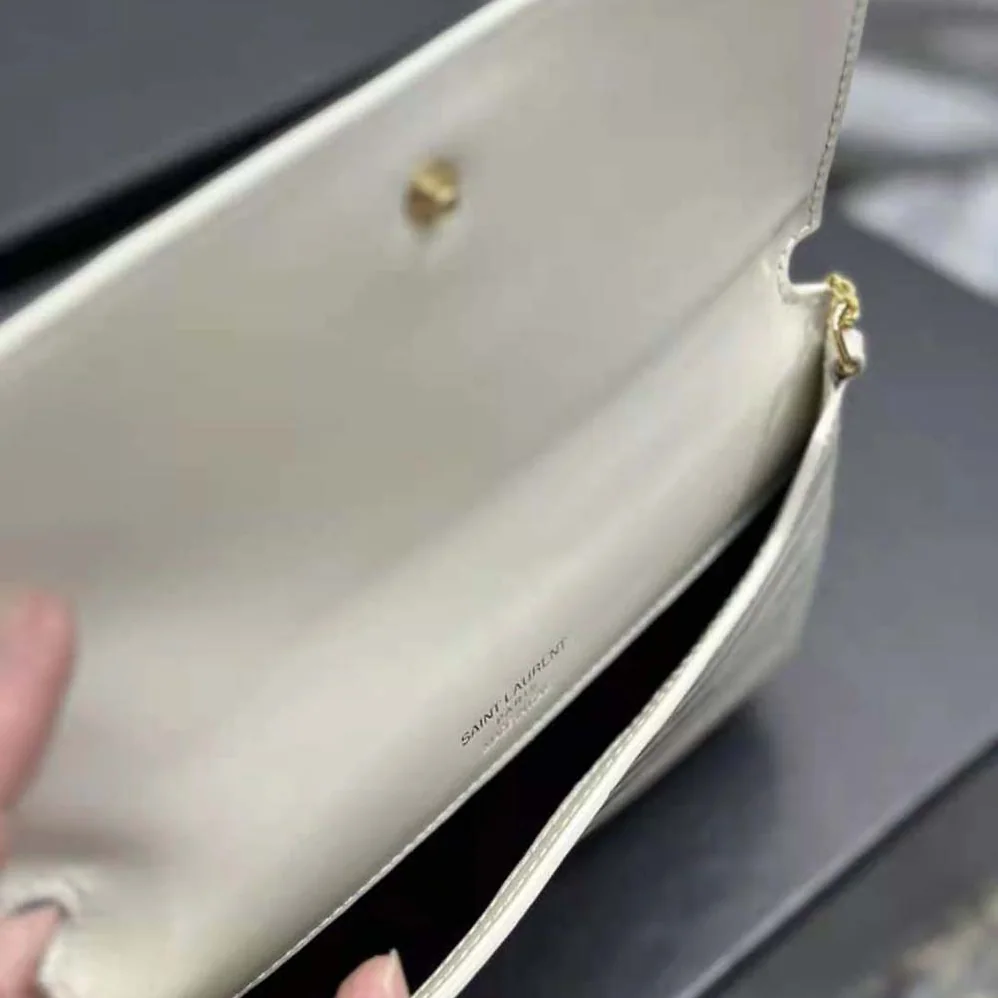 Saint Laurent YSL Cassandre Phone Holder with Strap in Shiny Crocodile-Embossed Leather for Women in White Saint Laurent YSL Cassandre Phone Holder with Strap in Shiny Crocodile-Embossed Leather for Women in White