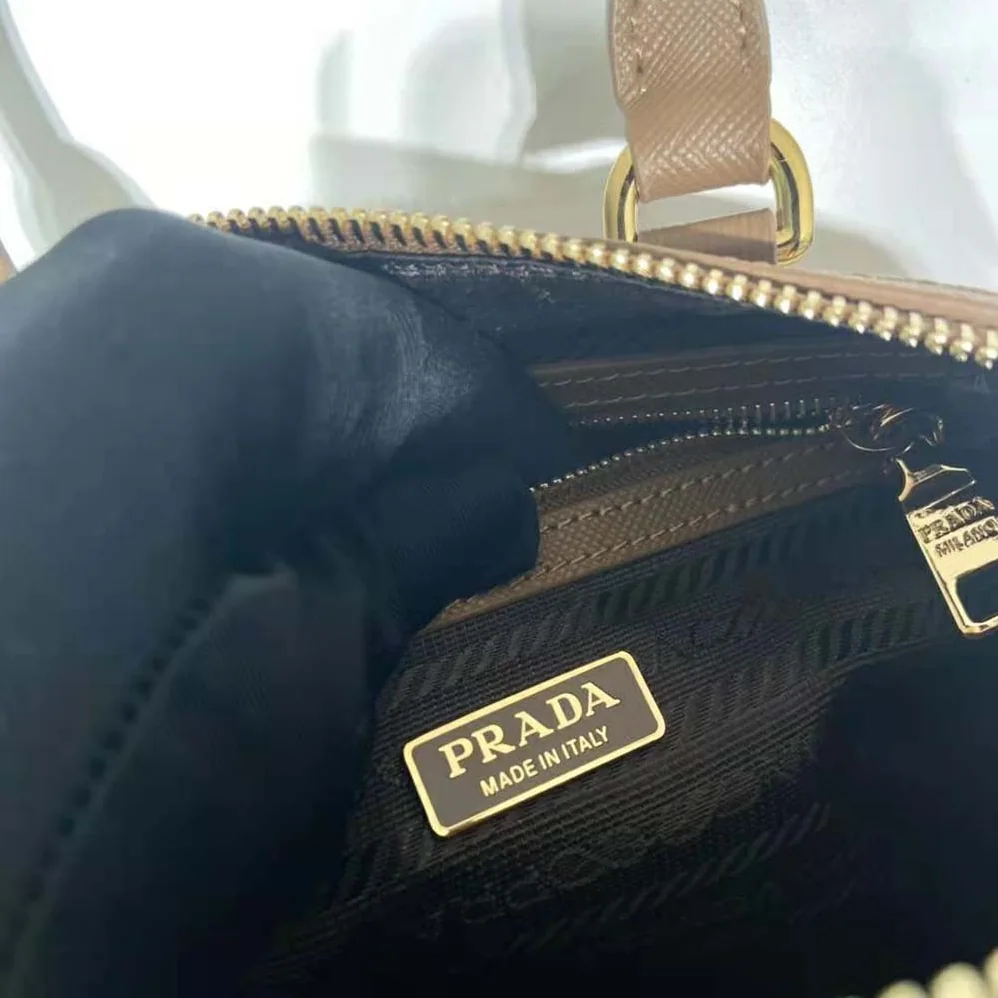 Prada Symbole Embroidered Jacquard Fabric Top-Handle Bag for Women in Brown