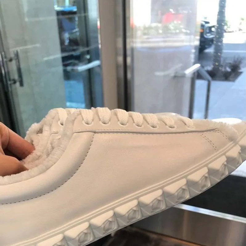 Stuart Weitzman The Fringiecoverstory Sneaker 25mm Heel Height for Women in White Stuart Weitzman The Fringiecoverstory Sneaker 25mm Heel Height for Women in White