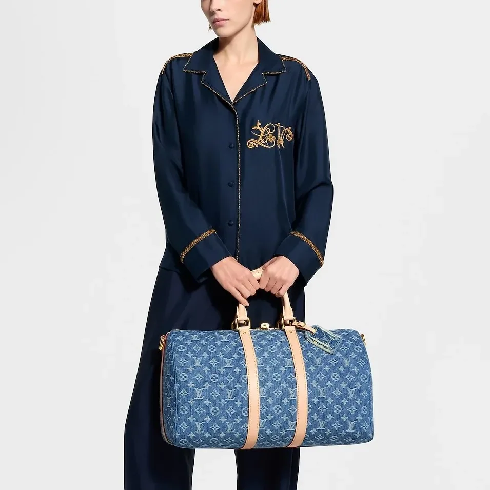 Louis Vuitton Keepall Bandouliere 45 Travel Bag in Blue Denim Gold Hardware Louis Vuitton Keepall Bandouliere 45 Travel Bag in Blue Denim Gold Hardware