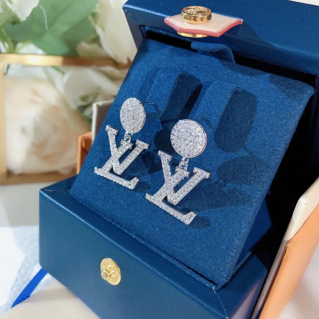 Louis Vuitton LV Iconic Twinkle Earrings Silver Tone Louis Vuitton LV Iconic Twinkle Earrings Silver Tone