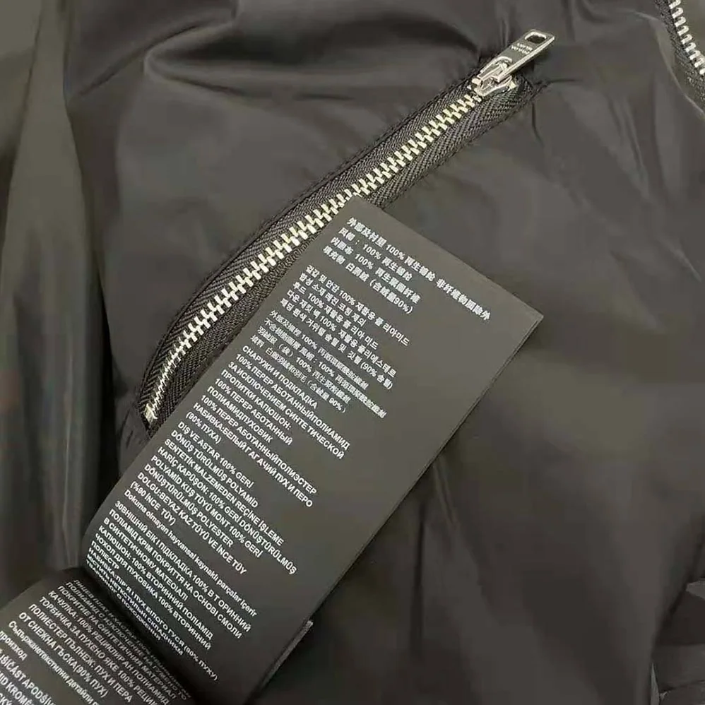 Prada Re-Nylon Cropped Hooded Down Jacket for Women in Black Prada Re-Nylon Cropped Hooded Down Jacket for Women in Black