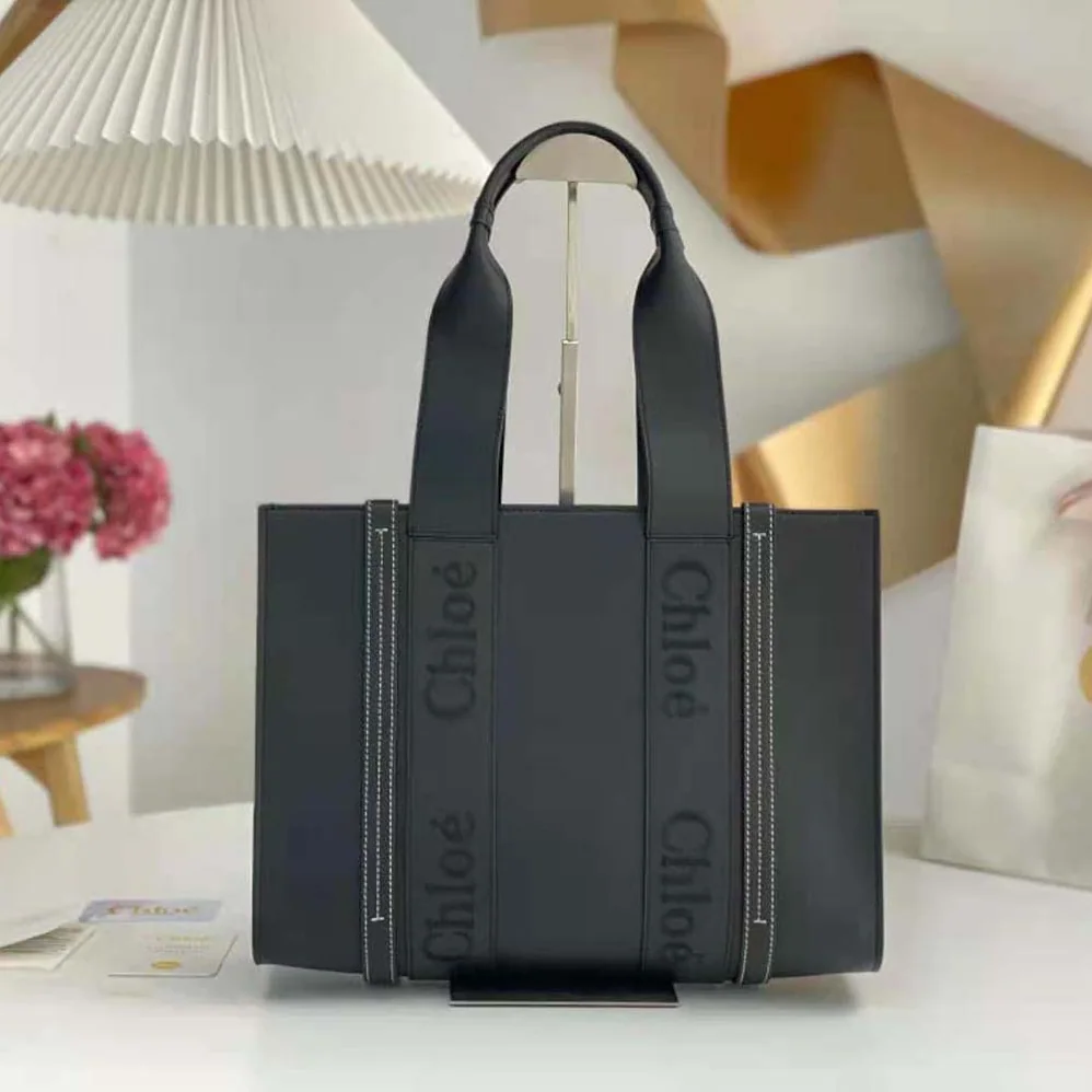 Chloe Medium Woody Tote Bag with Embroidered Chloé Logo for Women in Black Chloe Medium Woody Tote Bag with Embroidered Chloé Logo for Women in Black