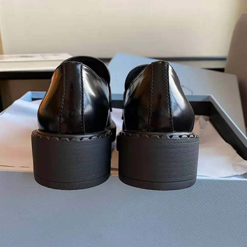 Prada Brushed Leather Loafers for Women in Black