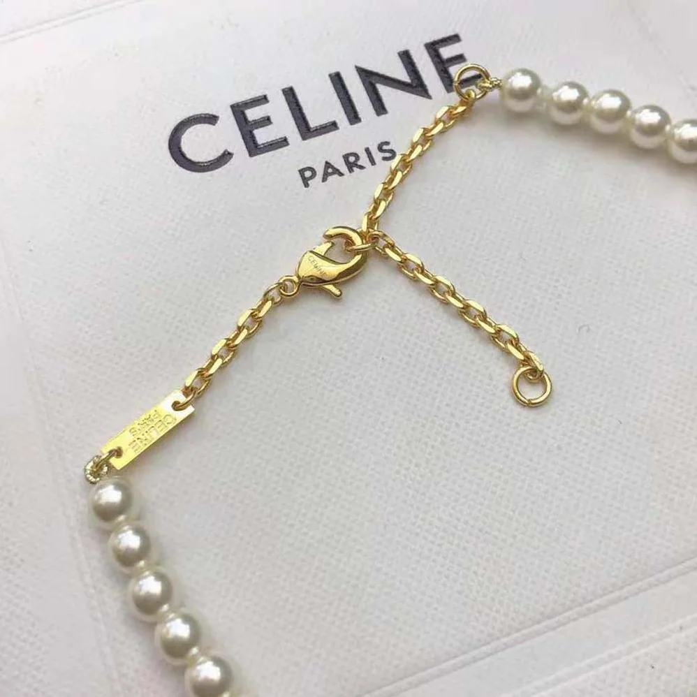 Celine Paris Pearl Bracelet in Brass with Gold Finish and Glass Pearls for Women Celine Paris Pearl Bracelet in Brass with Gold Finish and Glass Pearls for Women