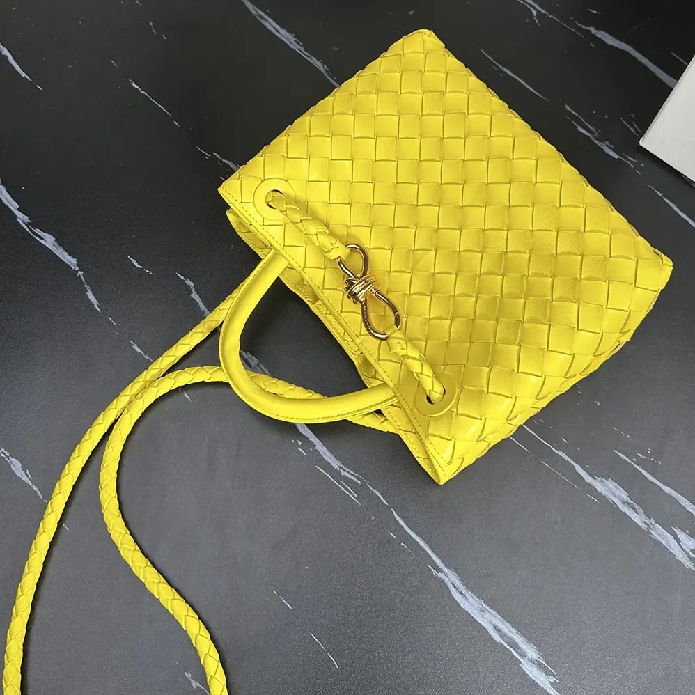 Bottega Veneta Small Andiamo Intrecciato Leather Top Handle Bag for Women in Yellow