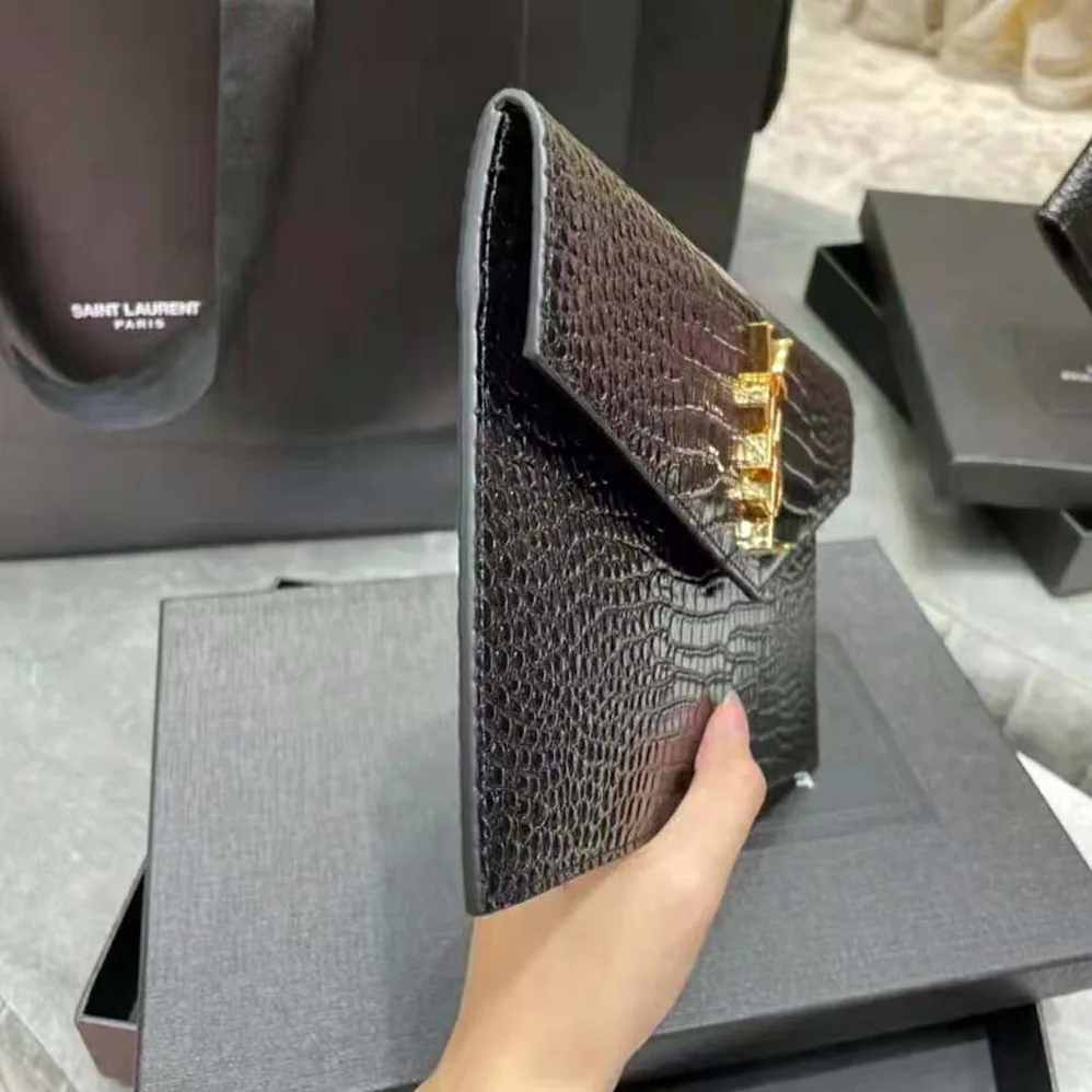 Saint Laurent YSL Uptown Pouch in Crocodile Embossed Shiny Leather for Women in Black
