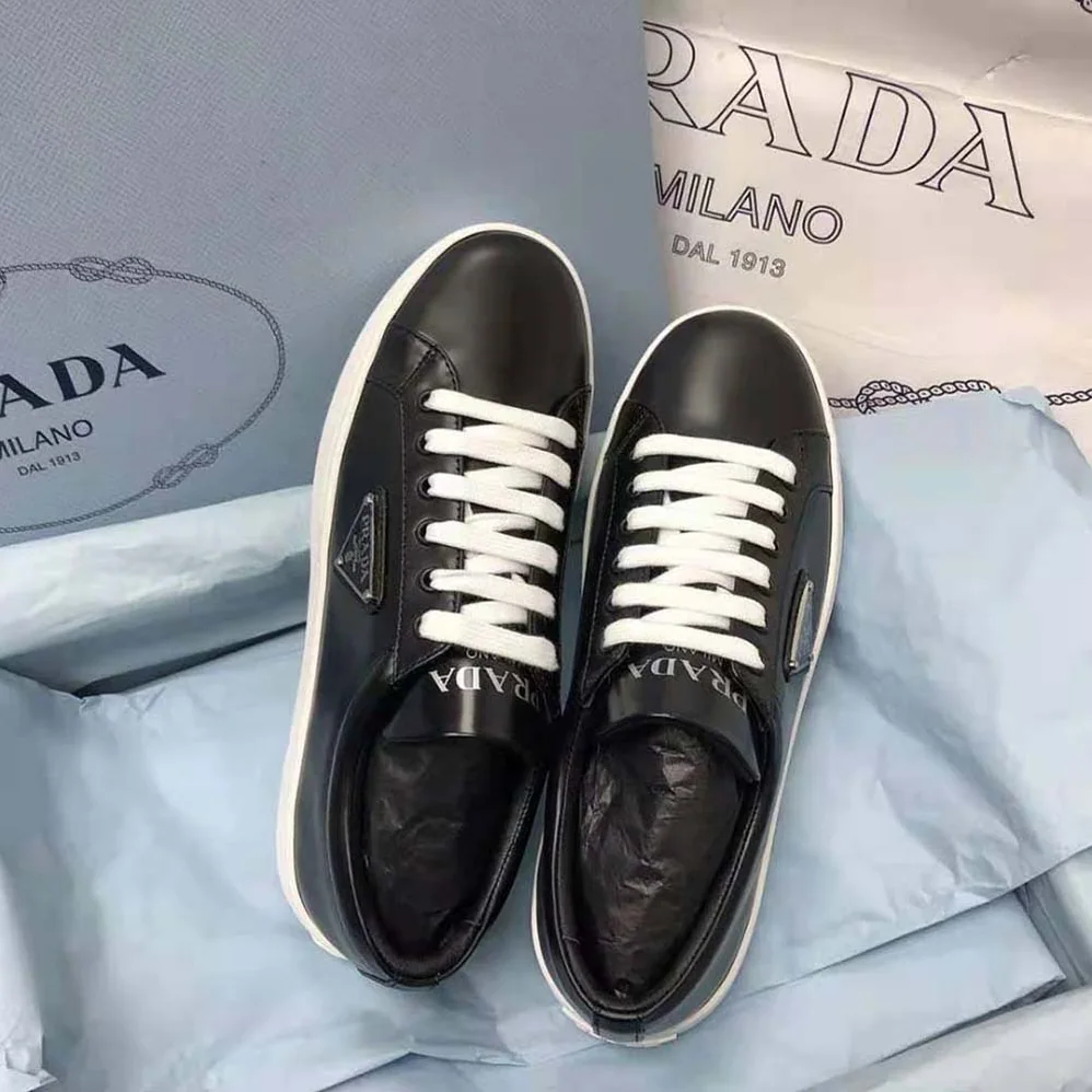 Prada Brushed Leather Sneakers for Men in Black