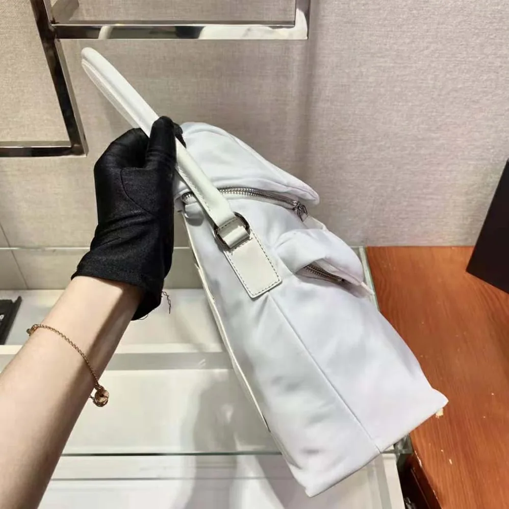 Prada Signaux Nylon and Leather Hobo Bag for Women in White Prada Signaux Nylon and Leather Hobo Bag for Women in White