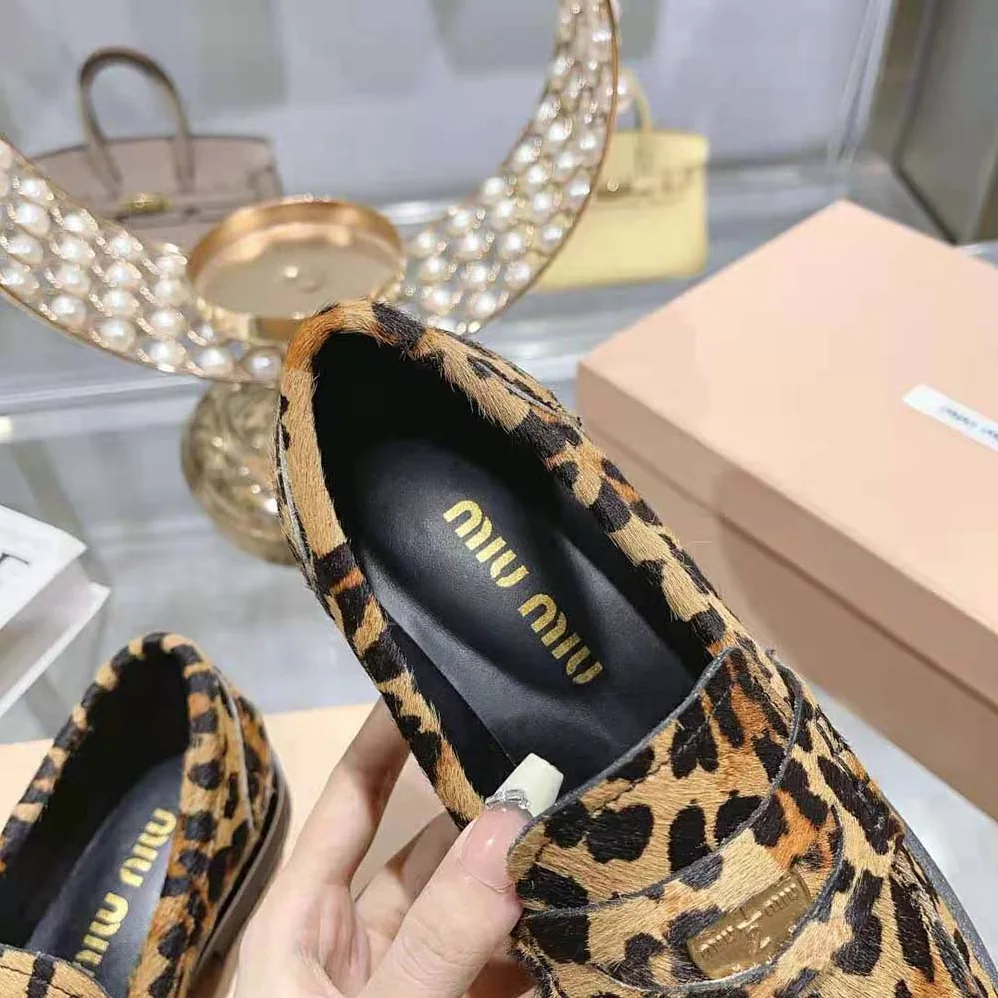 Miu Miu Leopard-print Calf Hair for Women in effect Loafers