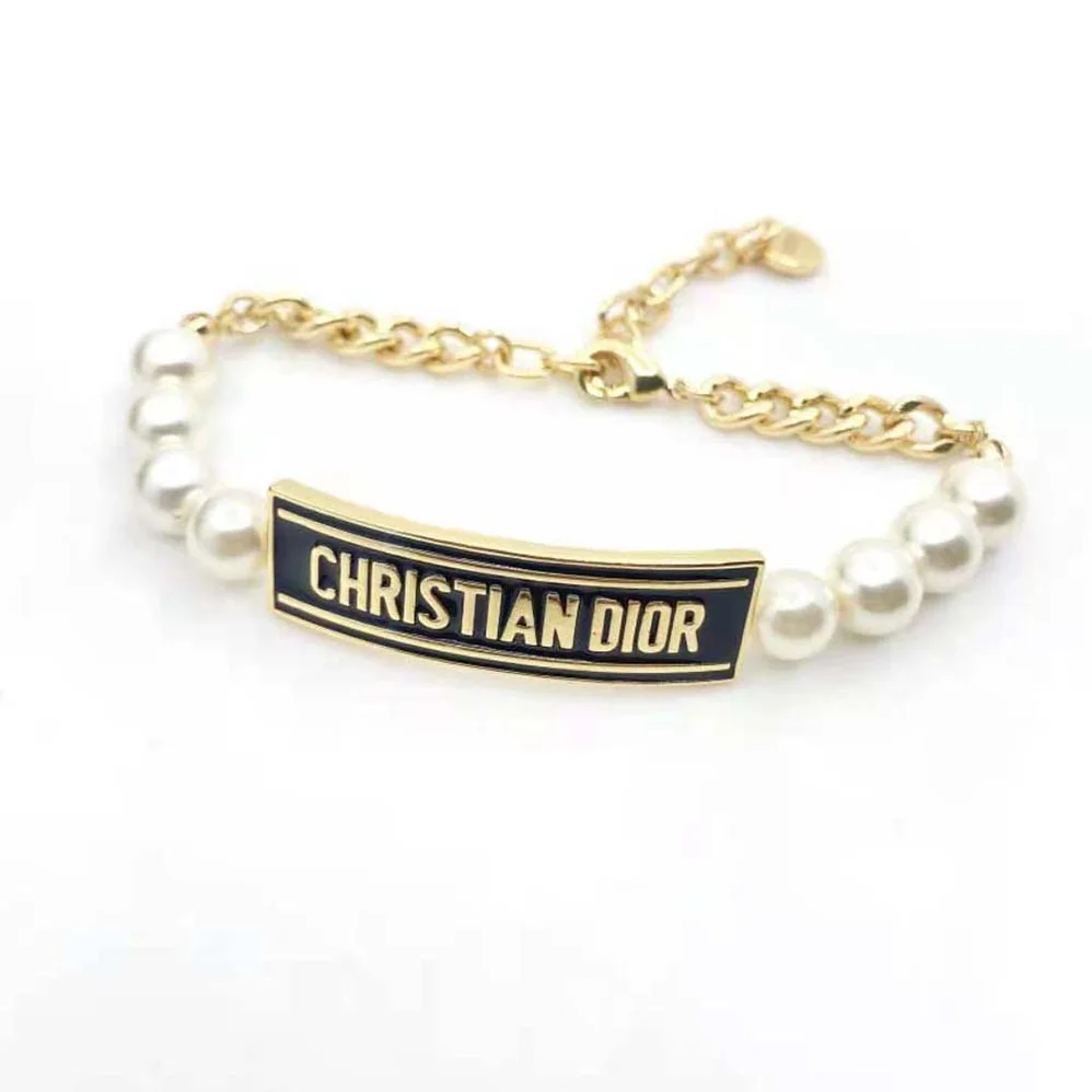 Dior Dior-id Bracelet Gold-Finish Metal with White Resin Pearls and Black Lacquer for Women Dior Dior-id Bracelet Gold-Finish Metal with White Resin Pearls and Black Lacquer for Women