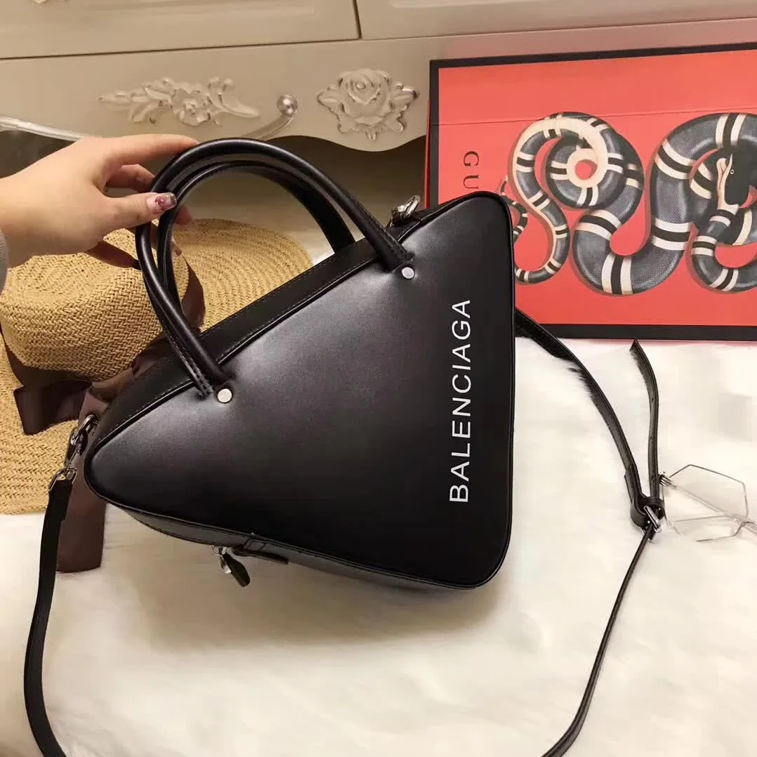 Balenciaga Triangle Duffle Small Calfskin Hand Carry and Shoulder Bag Balenciaga Triangle Duffle Small Calfskin Hand Carry and Shoulder Bag