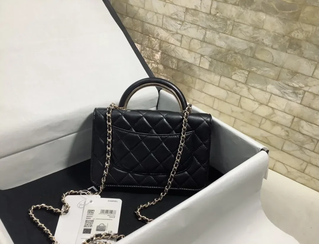 Chanel Hand-Held Oblique Cross Bag Black
