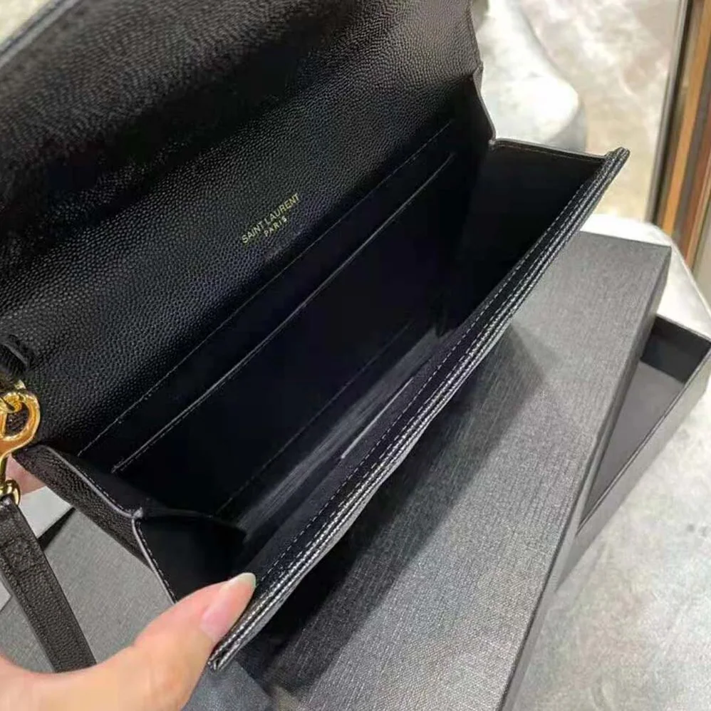 Saint Laurent YSL Monogram Clutch in Quilted Grain de Poudre Embossed Leather for Women in Black Saint Laurent YSL Monogram Clutch in Quilted Grain de Poudre Embossed Leather for Women in Black