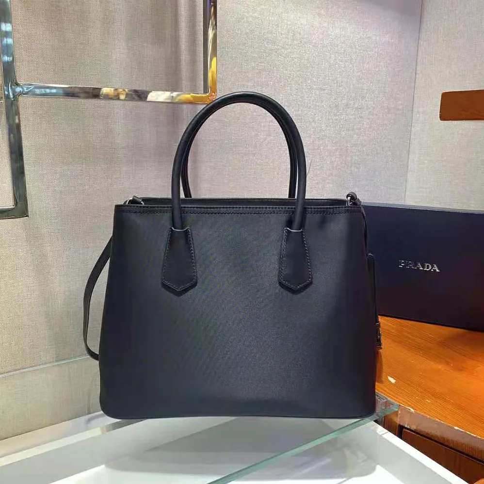 Prada Prada Double nylon and Saffiano Leather Bag for Women in Black