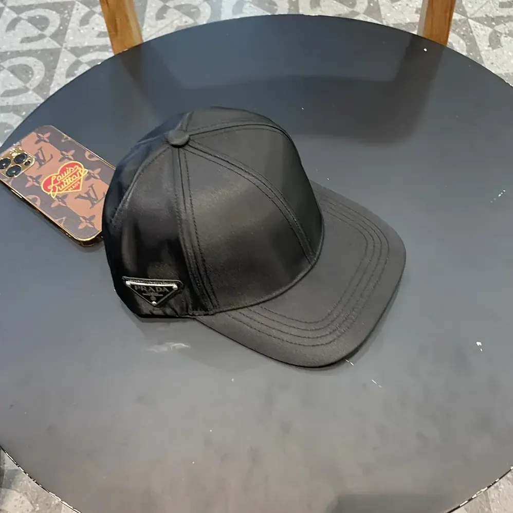 Prada Re-Nylon Baseball Cap for Unisex in Black Prada Re-Nylon Baseball Cap for Unisex in Black