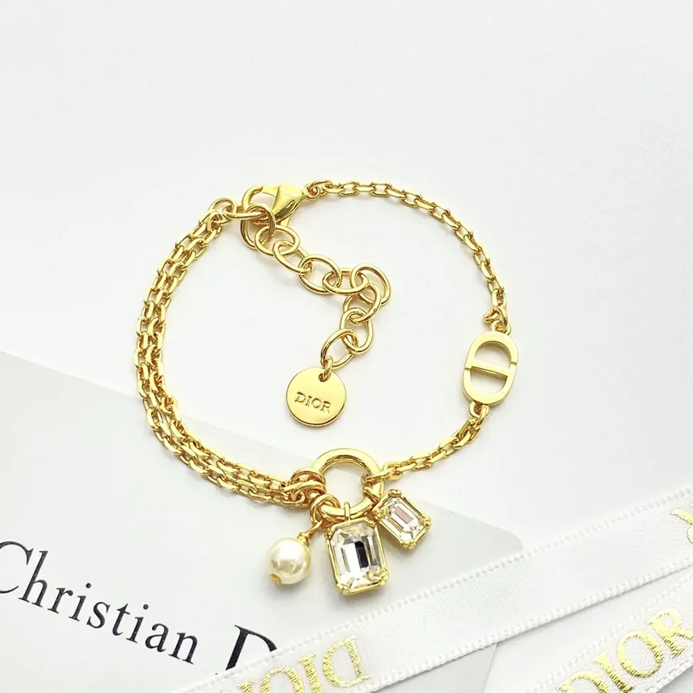 Dior Petit CD Bracelet Gold-Finish Metal with a White Resin Pearl and Silver for Women in Tone Crystals Dior Petit CD Bracelet Gold-Finish Metal with a White Resin Pearl and Silver for Women in Tone Crystals