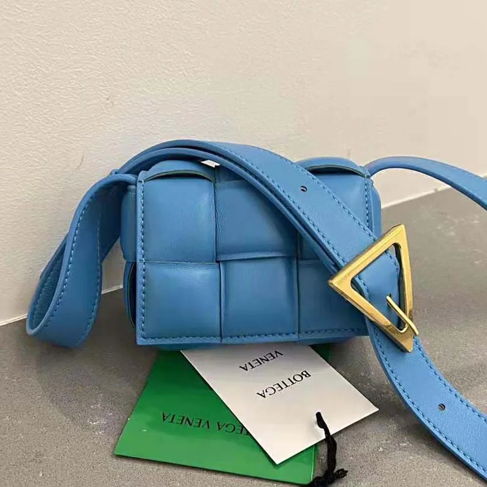 Bottega Veneta Candy Padded Cassette Mini Padded Intreccio Leather Cross-Body Bag for Women in Blue Bottega Veneta Candy Padded Cassette Mini Padded Intreccio Leather Cross-Body Bag for Women in Blue