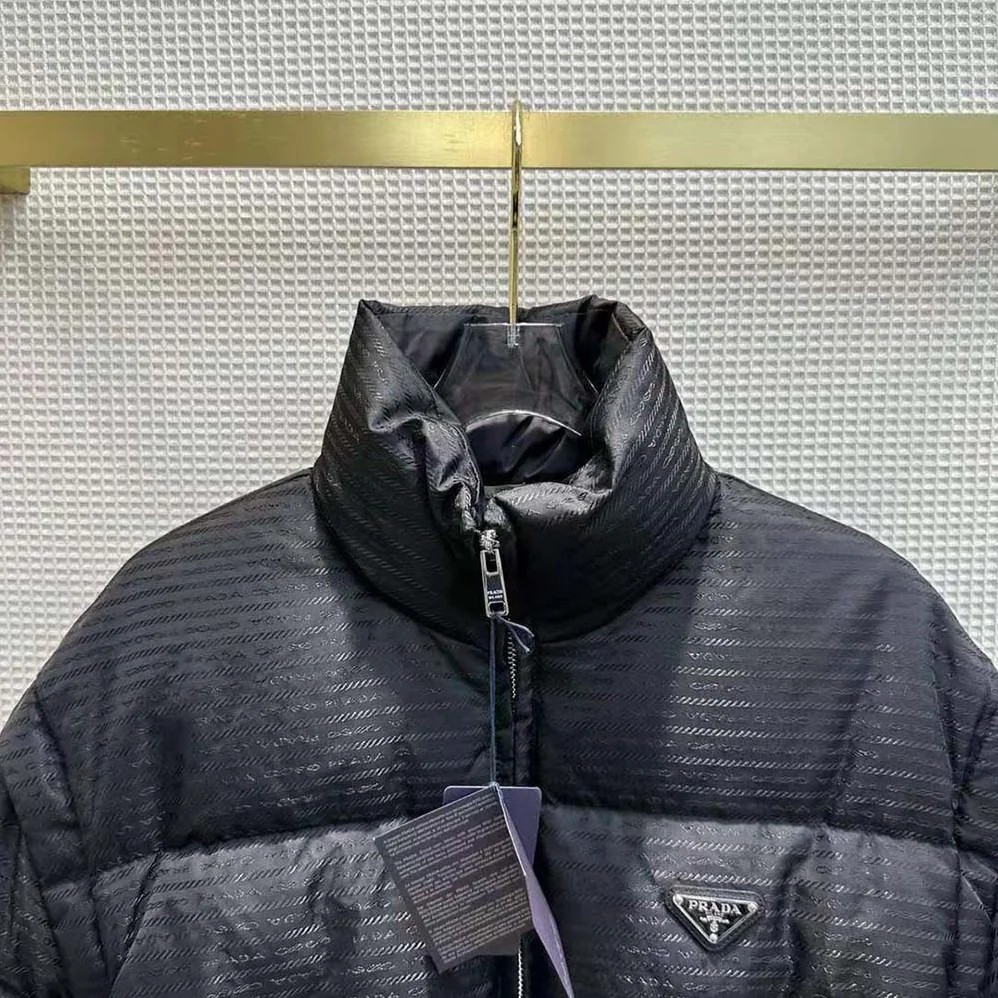 Prada Re-Nylon Cropped Hooded Down Jacket for Women in Black Prada Re-Nylon Cropped Hooded Down Jacket for Women in Black