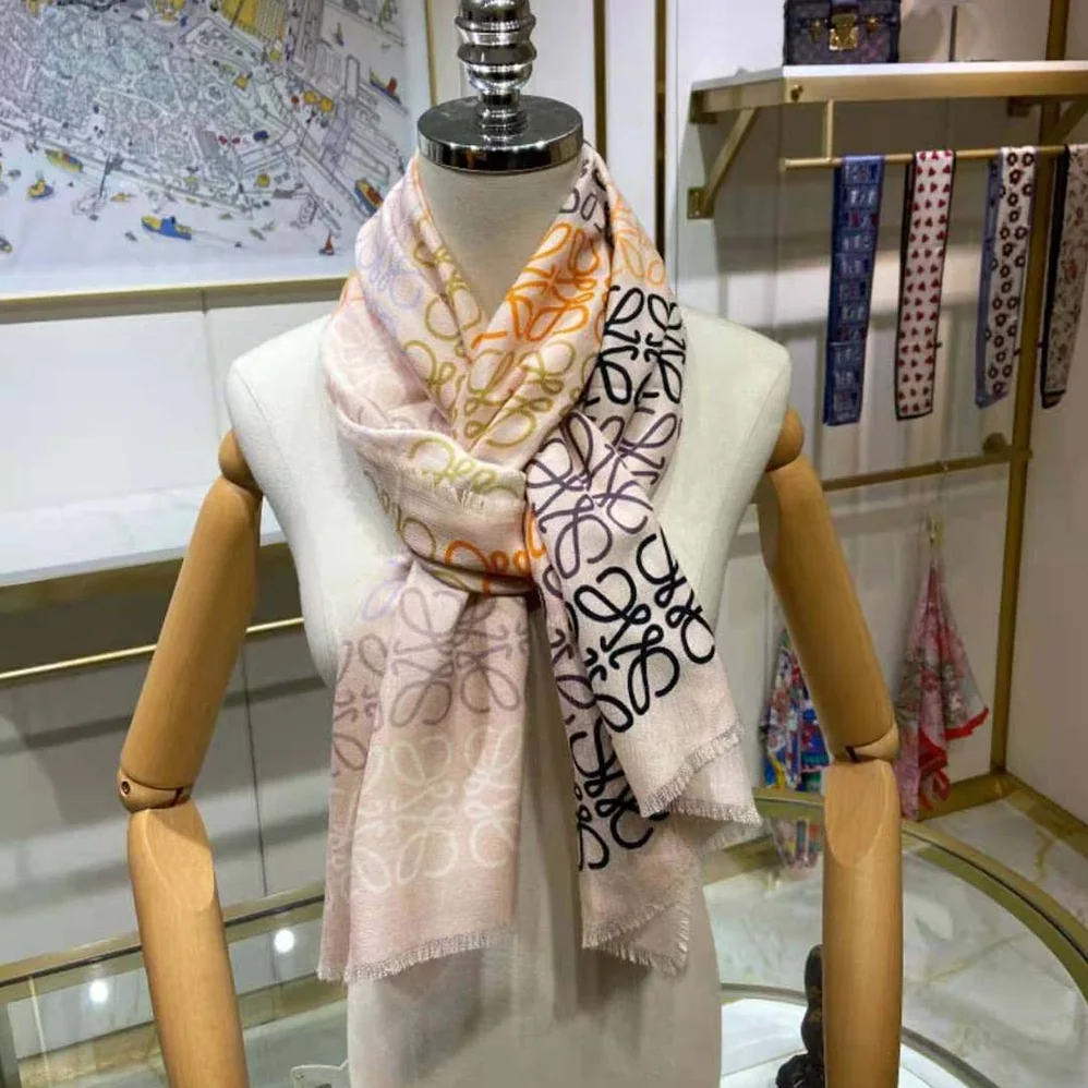 Loewe Anagram Lines Scarf in Wool and Cashmere for Women in White Loewe Anagram Lines Scarf in Wool and Cashmere for Women in White