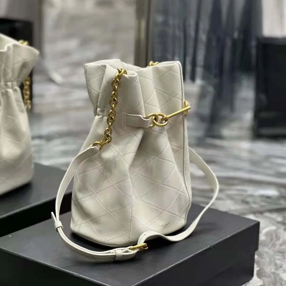 Saint Laurent YSL Le Maillon Hook Bucket Bag in Supple Leather for Women in White Saint Laurent YSL Le Maillon Hook Bucket Bag in Supple Leather for Women in White