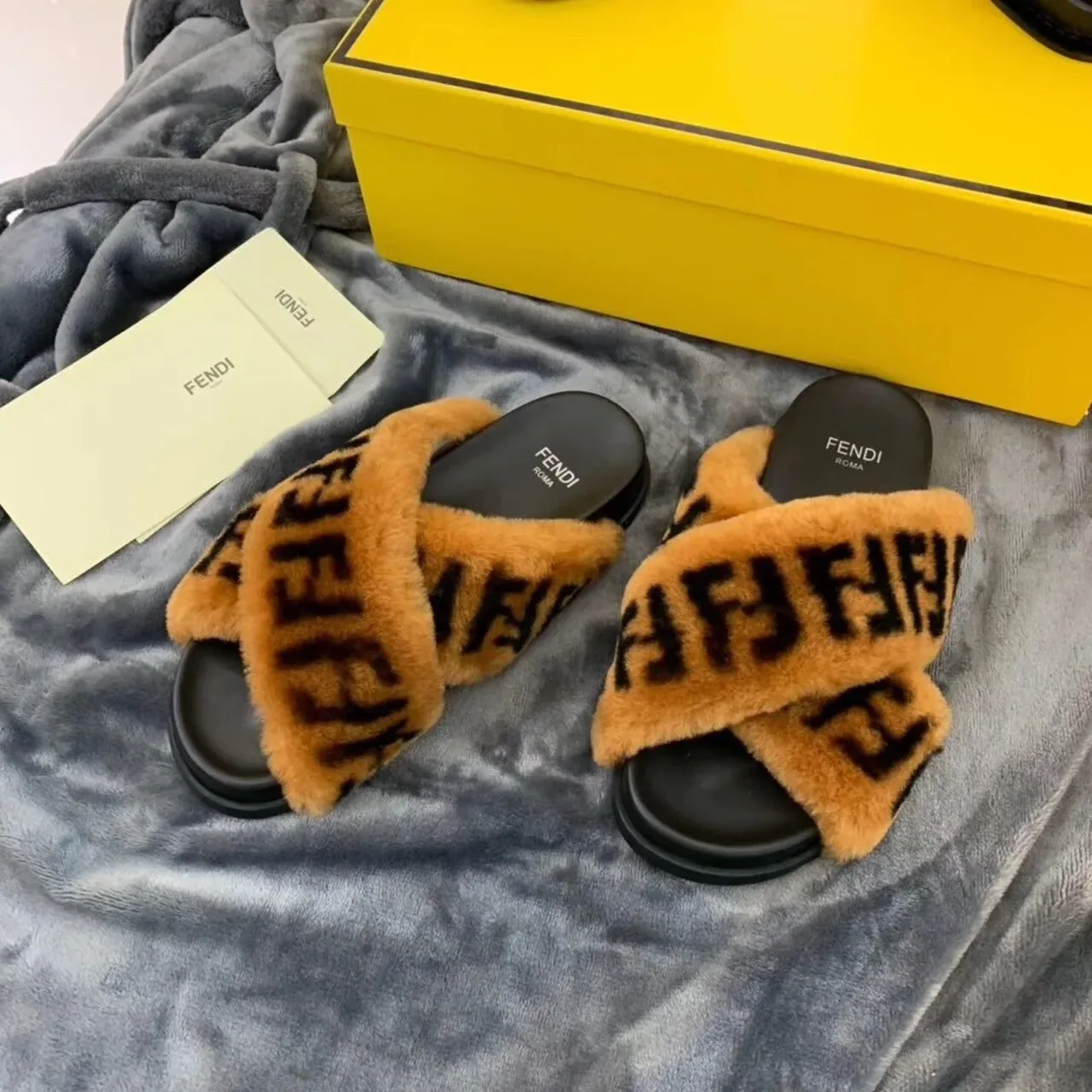 Fendi Shearling FF Logo Leather & Dyed Shearling Fur Cross Slides Fall/Winter 2019 Collection, Black in Brown Fendi Shearling FF Logo Leather & Dyed Shearling Fur Cross Slides Fall/Winter 2019 Collection, Black in Brown