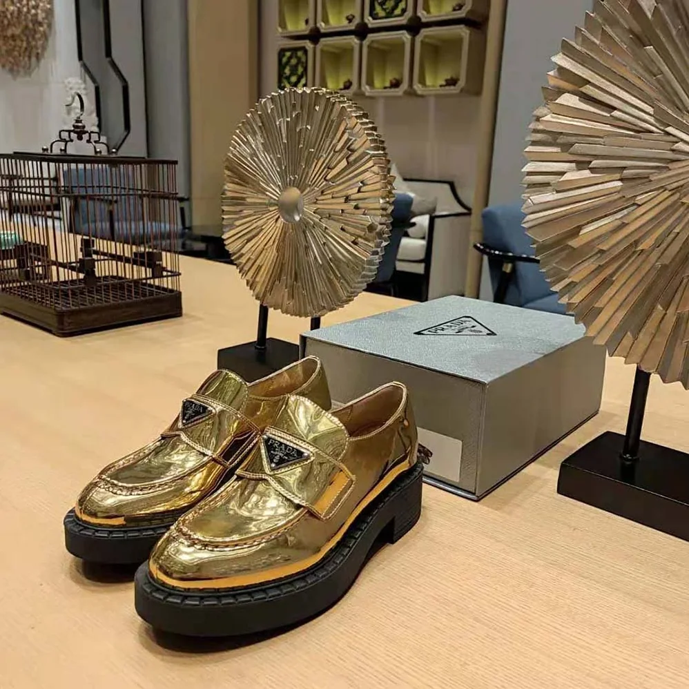 Prada Metallic Leather Loafers for Women in Gold