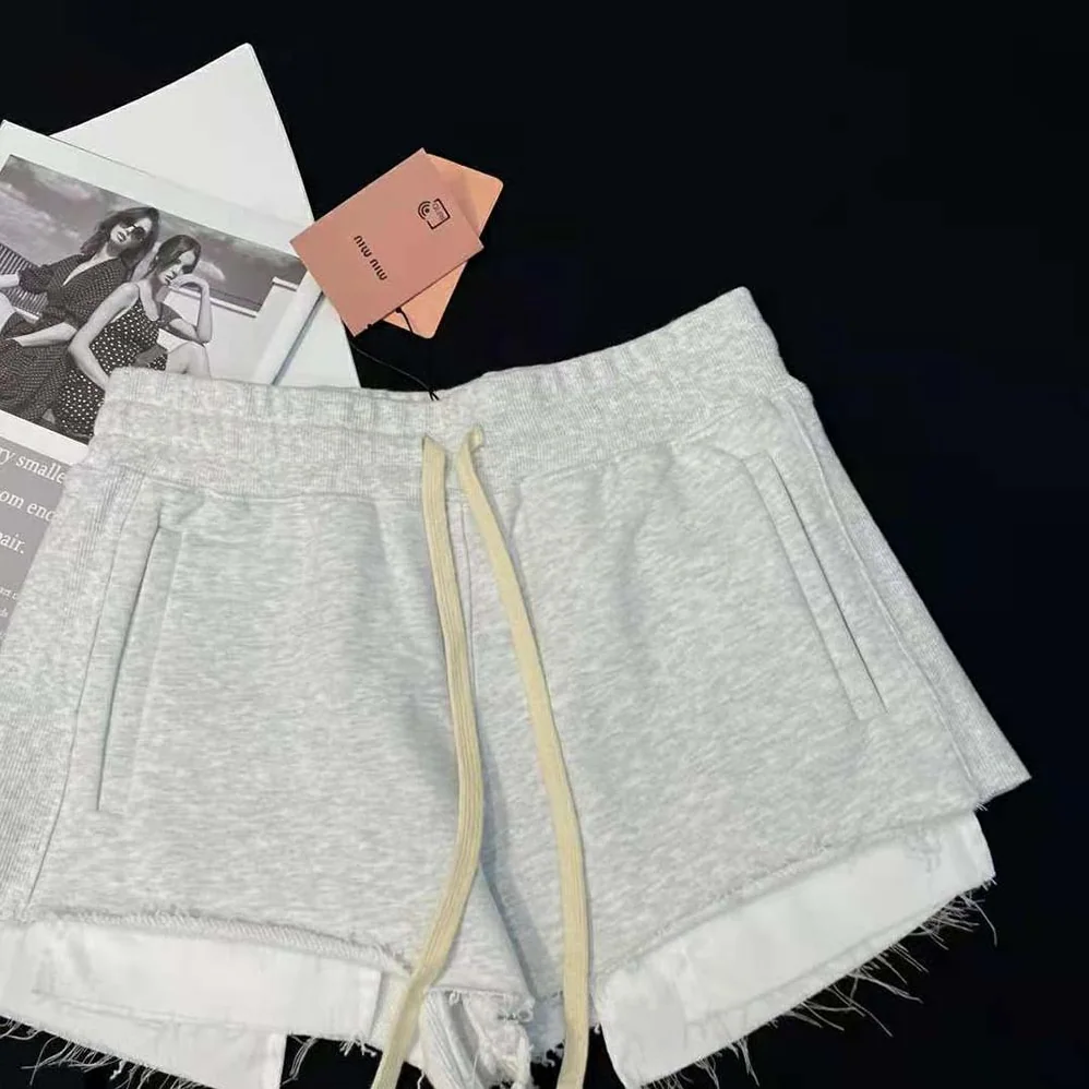 Miu Miu Embroidered Cotton Fleece Shorts for Women in Silver