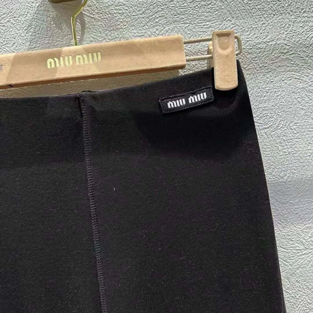 Miu Miu Silk Jersey Pants with Logo Patch for Women in Black Miu Miu Silk Jersey Pants with Logo Patch for Women in Black