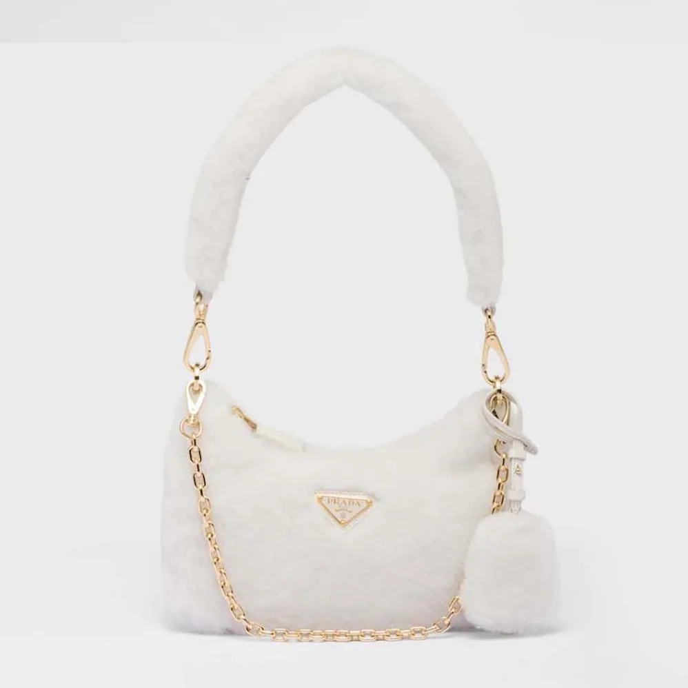 Prada Shearling Mini-Bag with the Enameled Metal Triangle Logo for Women in White Prada Shearling Mini-Bag with the Enameled Metal Triangle Logo for Women in White