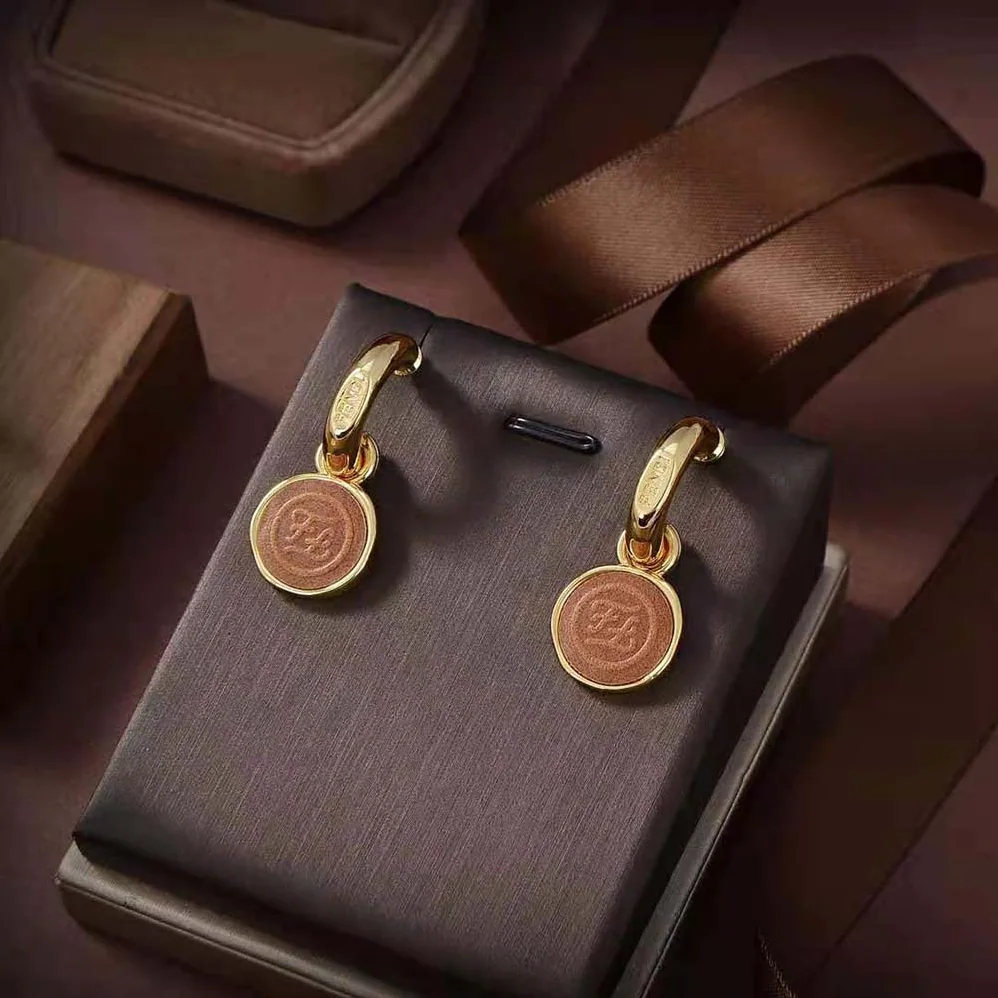 Fendi Karligraphy Earrings Gold for Women in Colored