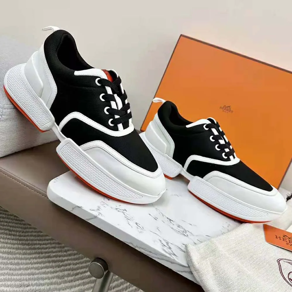 Hermes Giga Sneaker in Mesh Pique and Calfskin for Women in Black Hermes Giga Sneaker in Mesh Pique and Calfskin for Women in Black