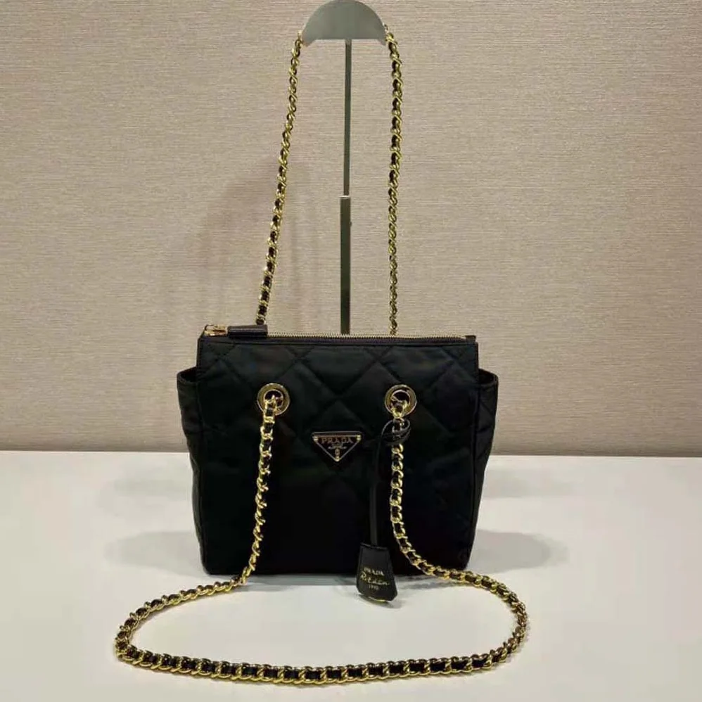 Prada Re-Edition 1995 Chaîne Re-Nylon Tote Bag for Women in Black Prada Re-Edition 1995 Chaîne Re-Nylon Tote Bag for Women in Black