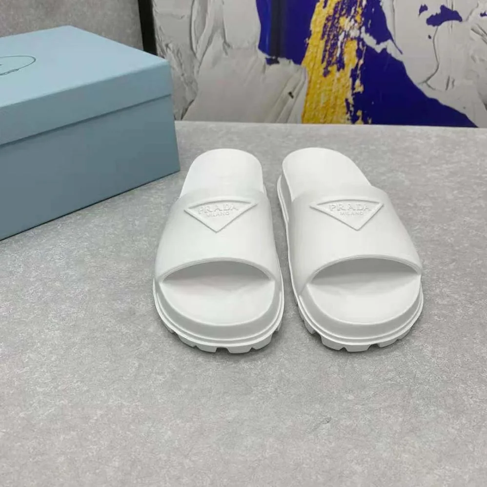 Prada Rubber Slides In 20 mm Heel Height for Women in White Prada Rubber Slides In 20 mm Heel Height for Women in White