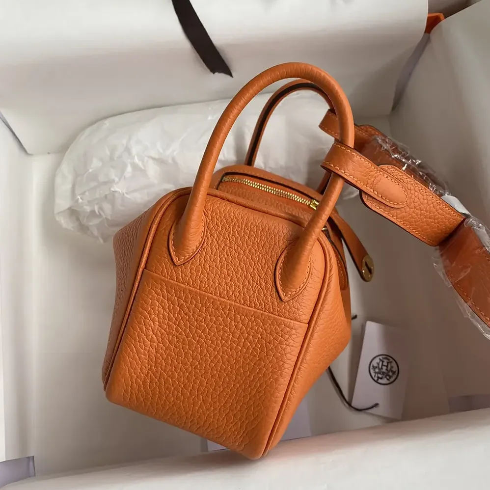 Hermes Lindy Mini 19 in Clemence Leather for Women in Orange/Gold Hermes Lindy Mini 19 in Clemence Leather for Women in Orange/Gold