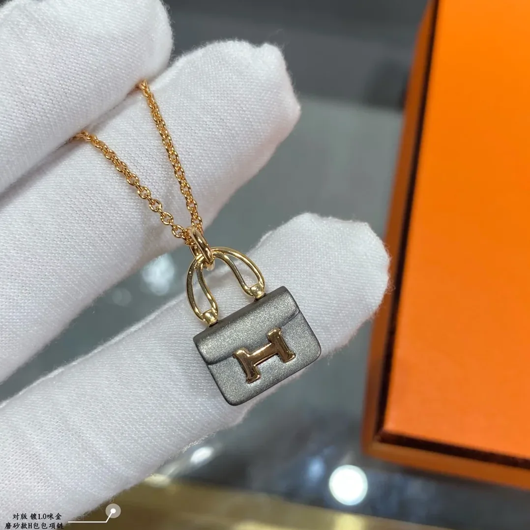 Hermes Constance Amulets Pendant Necklace Gold Tone Hermes Constance Amulets Pendant Necklace Gold Tone