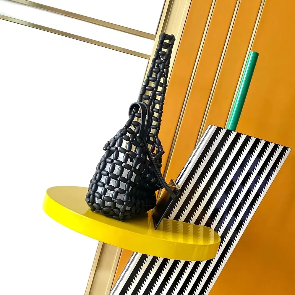 Saint Laurent YSL Le 5 À 7 In Wood Beads for Women in Black Saint Laurent YSL Le 5 À 7 In Wood Beads for Women in Black