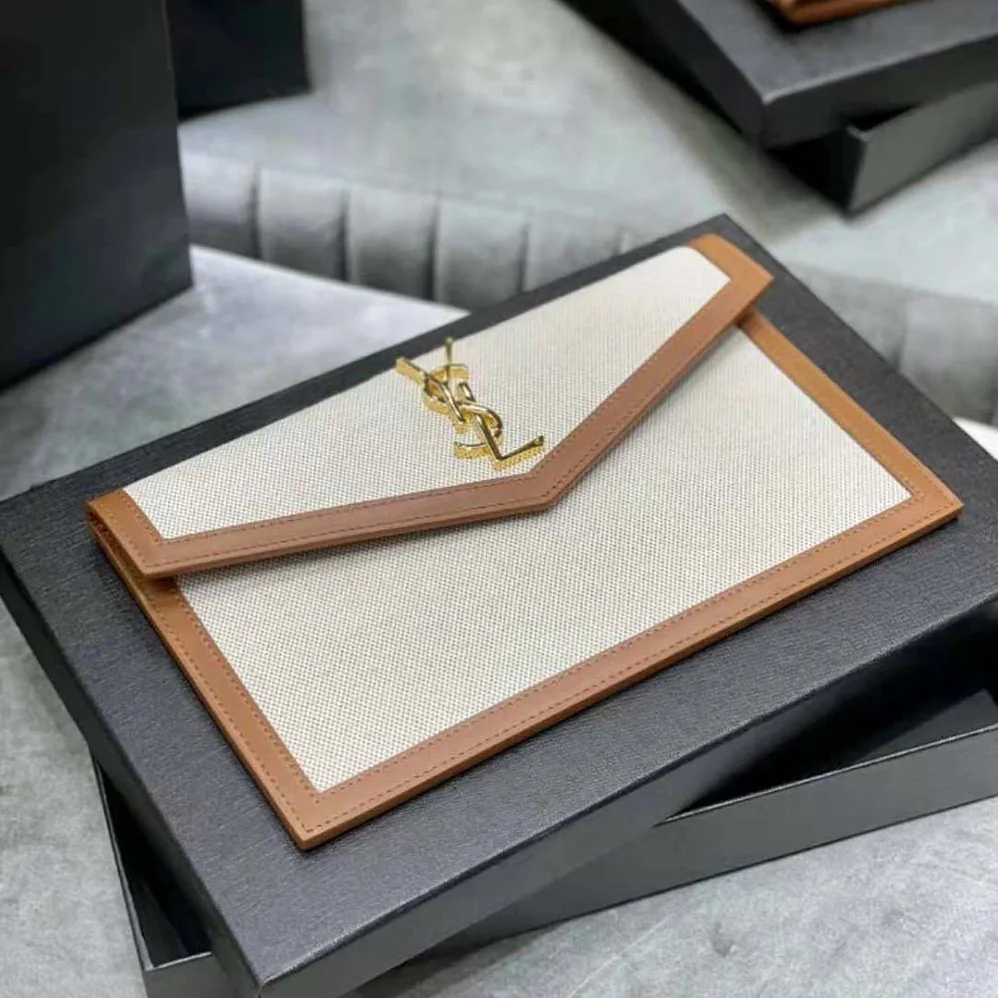 Saint Laurent YSL Uptown Pouch in Canvas and Smooth Leather for Women