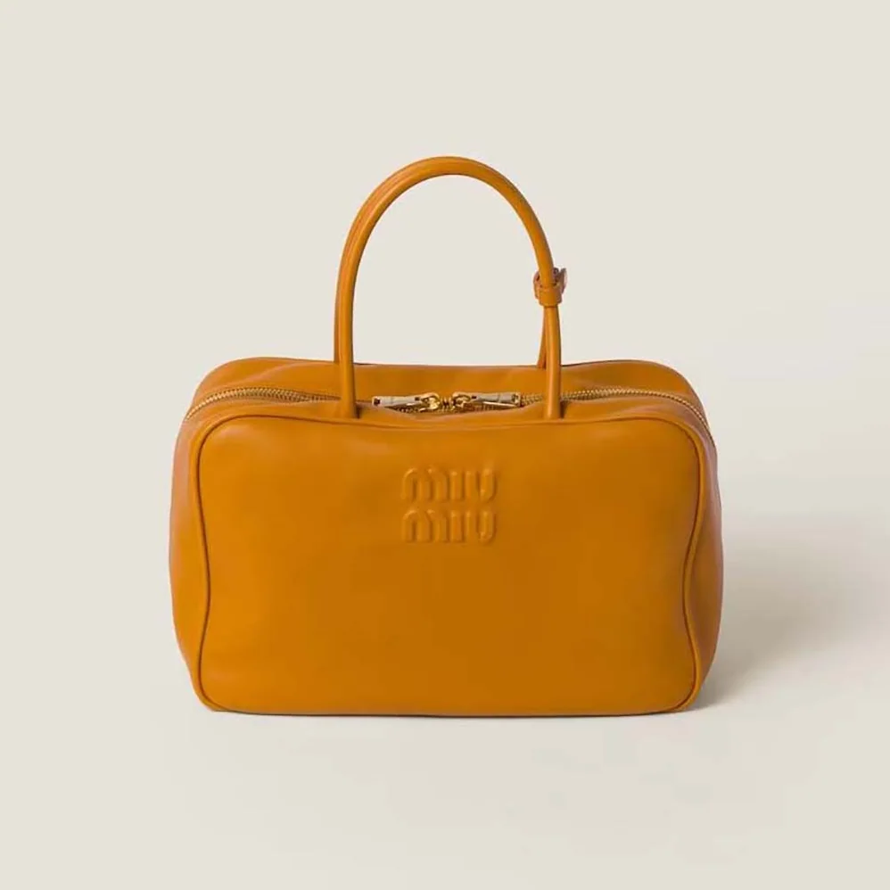 Miu Miu Leather Top-handle Bag with Embossed Lettering Logo for Women in Orange Miu Miu Leather Top-handle Bag with Embossed Lettering Logo for Women in Orange