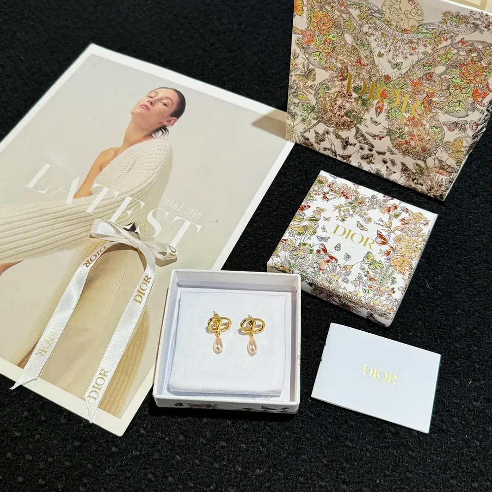 Dior Petit CD Earrings Gold-Finish Metal and Iridescent Pink Resin Pearls for Women Dior Petit CD Earrings Gold-Finish Metal and Iridescent Pink Resin Pearls for Women