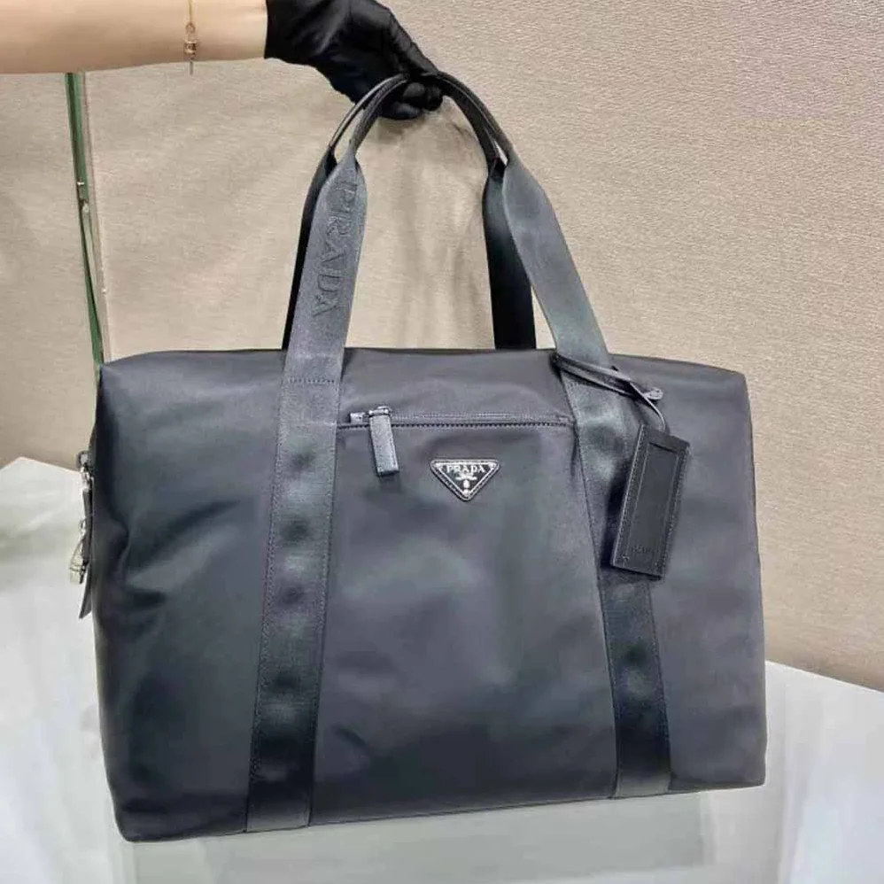 Prada Re-Nylon and Saffiano Leather Duffle Bag for Unisex in Black Prada Re-Nylon and Saffiano Leather Duffle Bag for Unisex in Black