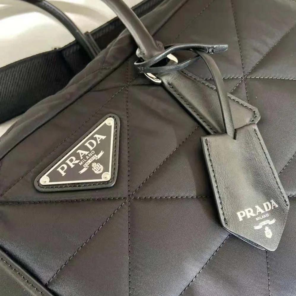 Prada Quilted Re-Nylon Travel Bag for Unisex in Black